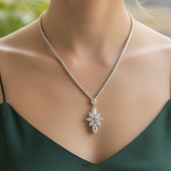 Borrow Jewelry - Radiant Silver Necklace with Floral Pendant